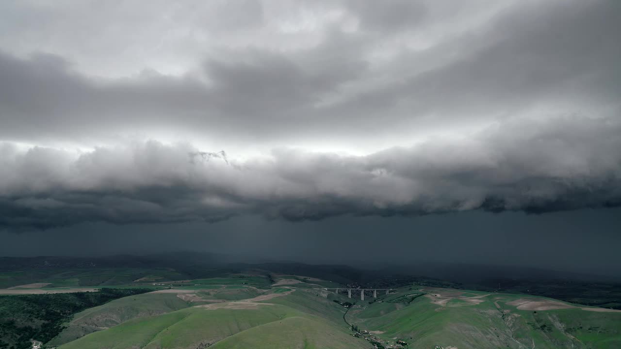 Download Free Video Stock Storm Clouds Over The Hills Live Wallpaper