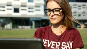 Download Free Video Stock Student Sitting Outside University With Laptop Live Wallpaper