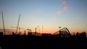 Download Free Video Stock Sunrise Above A Rollercoaster Live Wallpaper