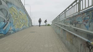 Download Free Video Stock Skateboarders In An Urban Area With Graffiti Live Wallpaper