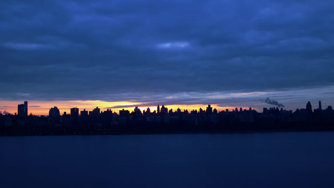 Download Free Video Stock sunrise over a dark city Live Wallpaper