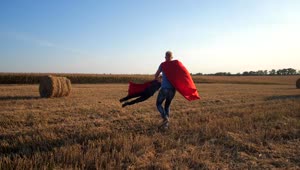 Download Free Video Stock superheros playing in a field Live Wallpaper