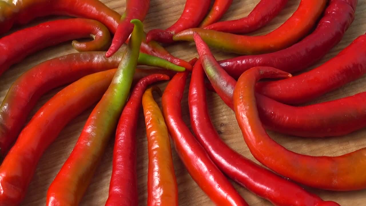 Download Free Video Stock swirling table of peppers Live Wallpaper