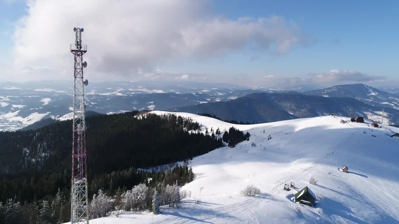 Download Free Video Stock tall telecommunication tower in the snow Live Wallpaper