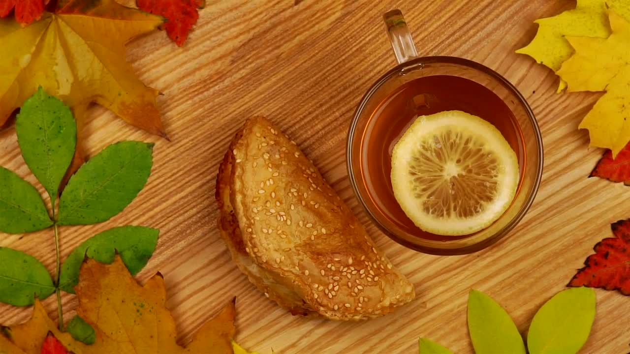 Download Free Video Stock tea and snack rotating on the table Live Wallpaper