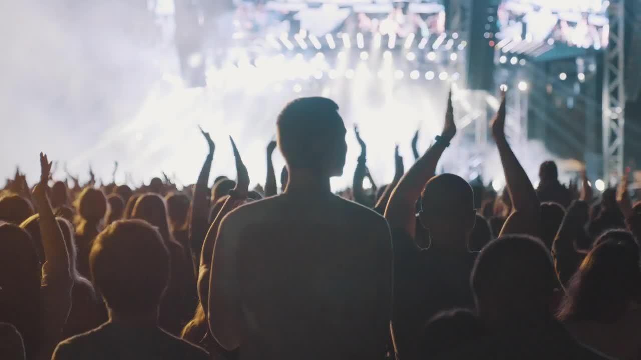 Download Free Video Stock the crowd enjoying a rock concert Live Wallpaper