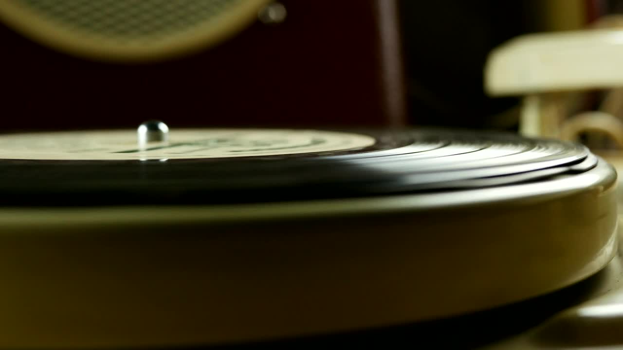 Download Free Video Stock the needle on rotating vinyl record Live Wallpaper