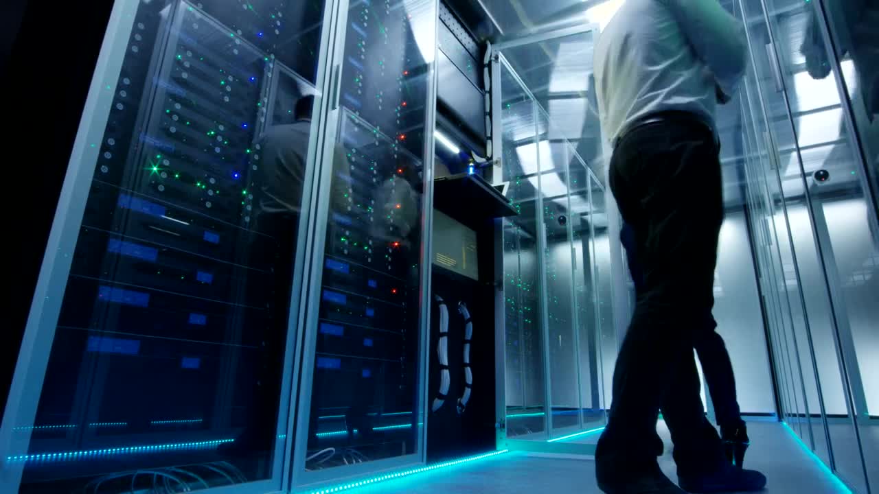 Download Free Video Stock time lapse of engineers working in a data center Live Wallpaper