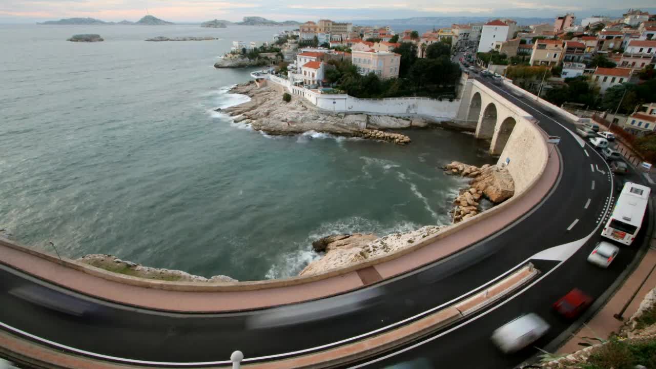 Download Free Video Stock time lapse of the coast with a street with traffic Live Wallpaper