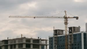 Download Free Video Stock time lapse of workers and construction cranes Live Wallpaper
