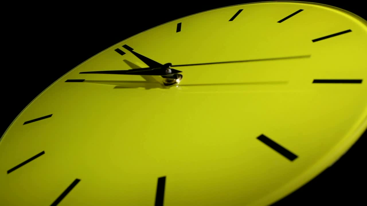 Download Free Video Stock timelapse of a yellow clock Live Wallpaper