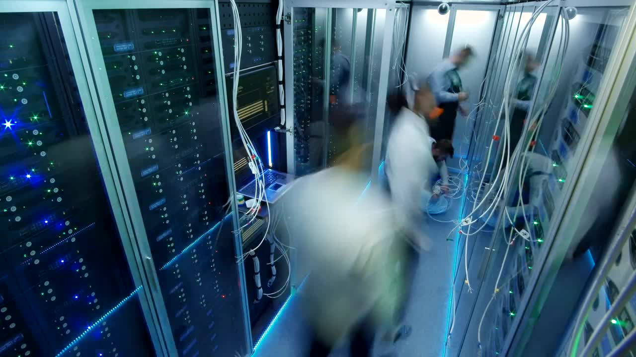 Download Free Video Stock timelapse of engineers working on data center Live Wallpaper