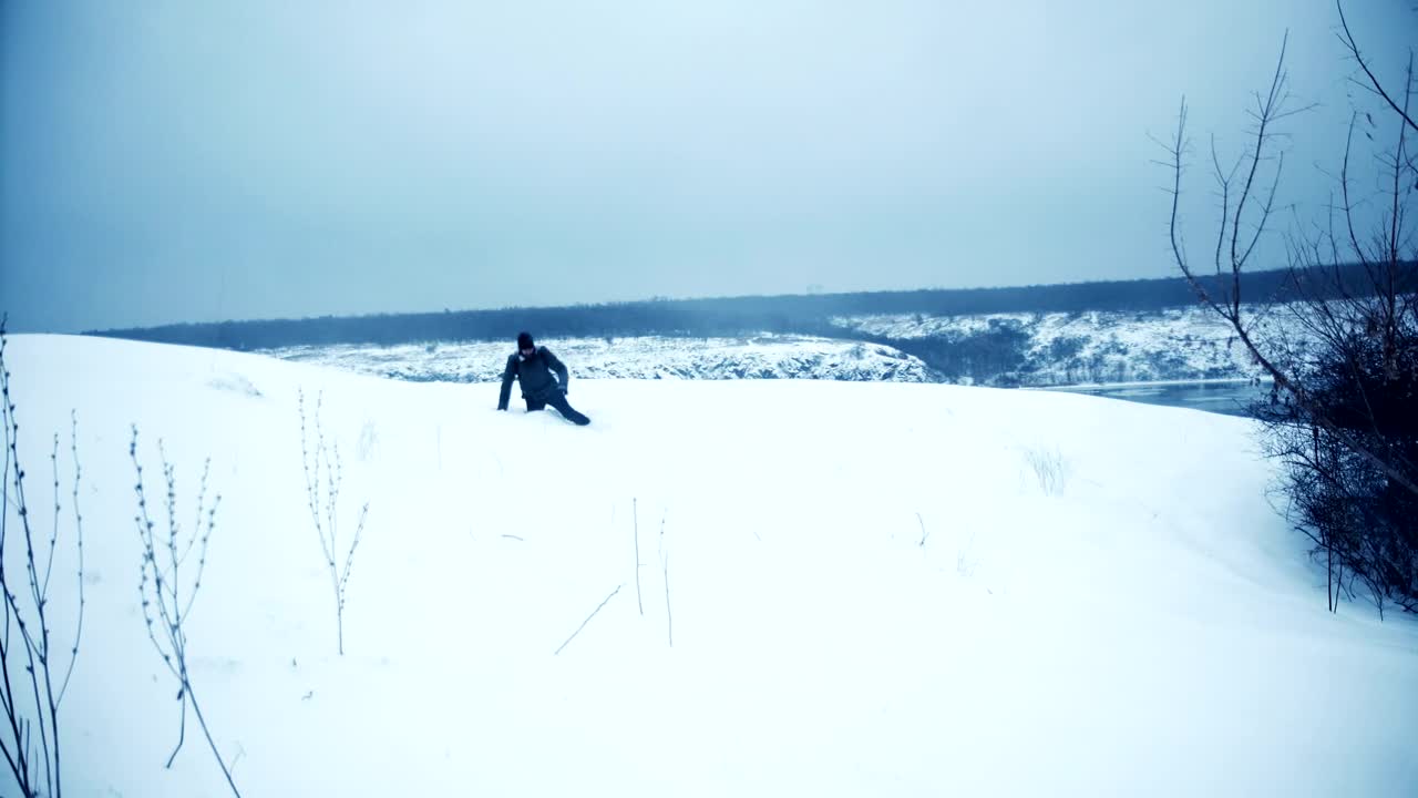 Download Free Video Stock tired man falls in the snow Live Wallpaper