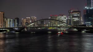 Download Free Video Stock tokyo bridge and water transport at night Live Wallpaper