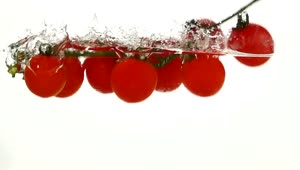 Download Free Video Stock tomatoes falling through water Live Wallpaper