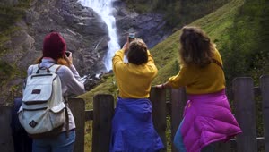 Download Free Video Stock tourists taking photos to a waterfall Live Wallpaper