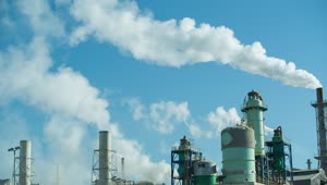 Download Free Video Stock towers and steam outlets of an industrial plant Live Wallpaper