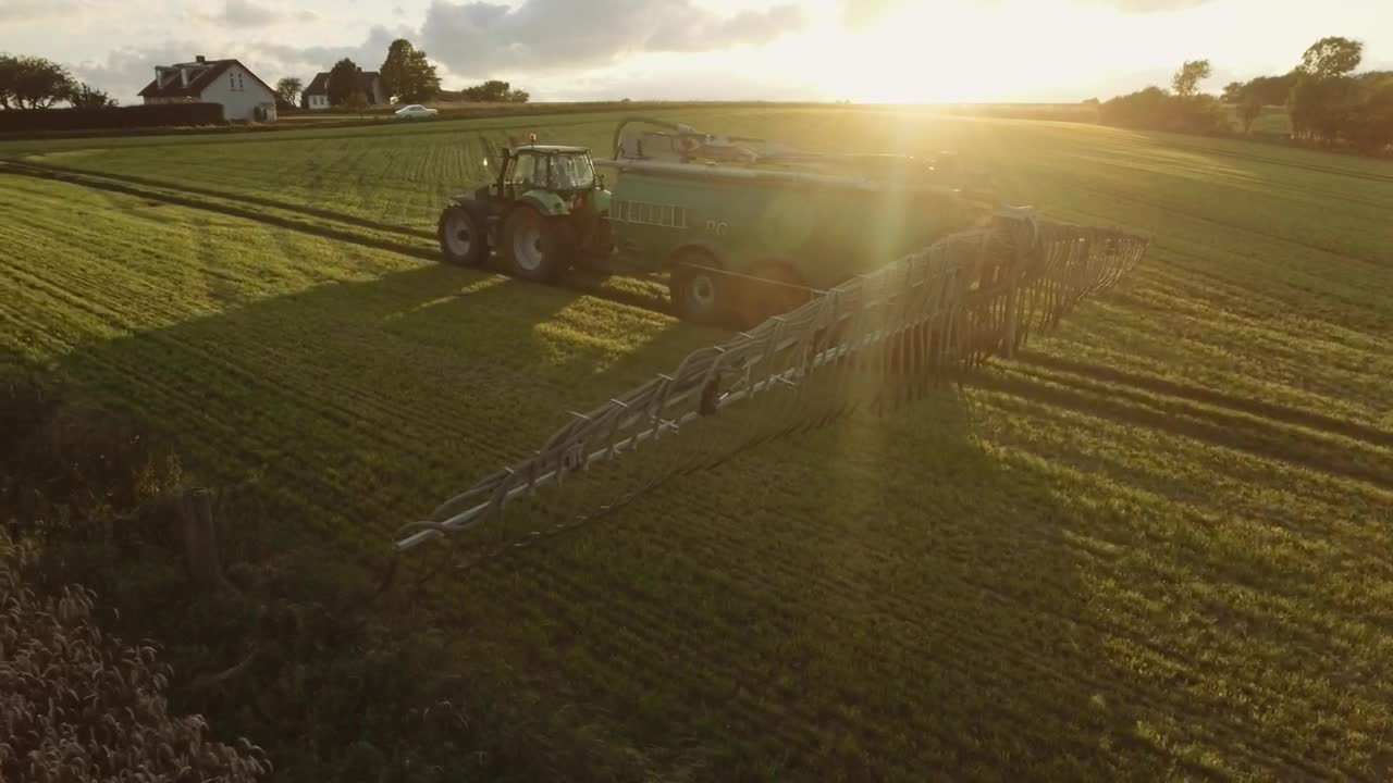 Download Free Video Stock tractor preparing to spray a field Live Wallpaper