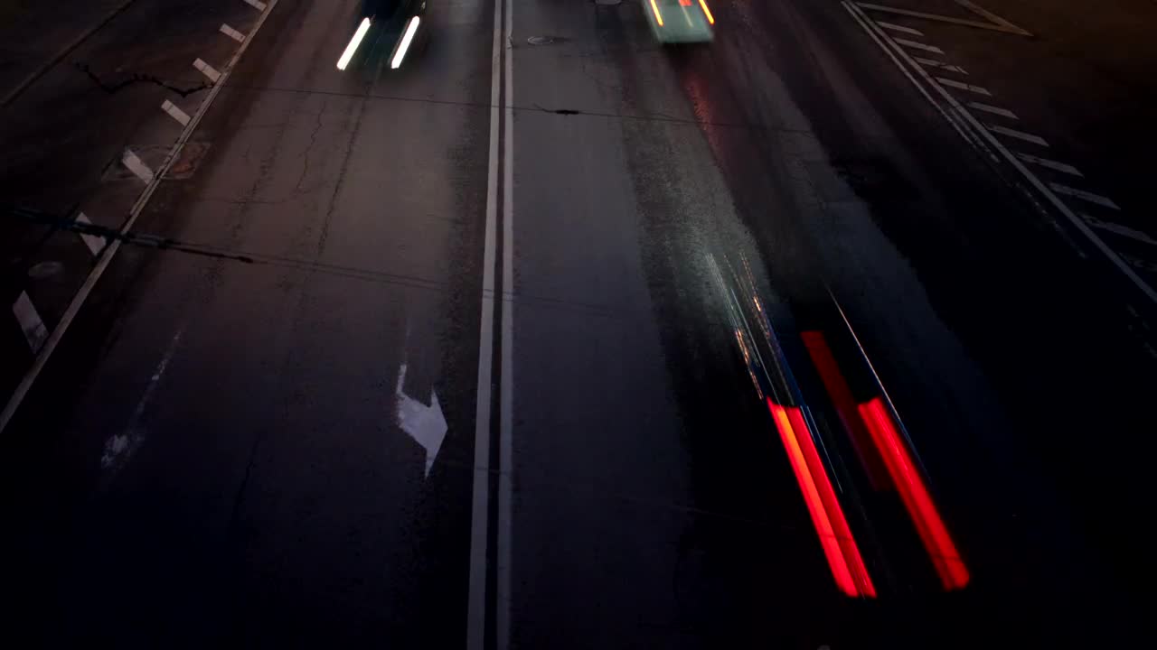 Download Free Video Stock traffic heading in two directions at night Live Wallpaper