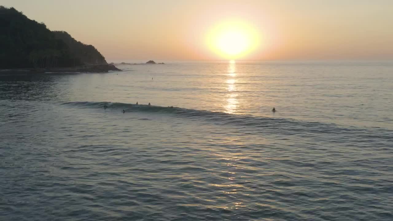 Download Free Stock Video Waves On A Beach With A Few Surfers Live Wallpaper