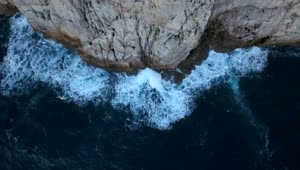 Download Free Stock Video Waves Hitting A Cliff Top Shot Live Wallpaper