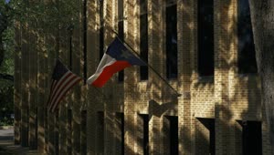 Download Free Stock Video Wall Of A Buildings With American And Texas Flags Live Wallpaper