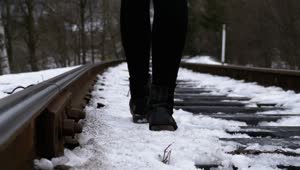 Download Free Stock Video Walking Over An Old Railway Tracks In The Winter Live Wallpaper
