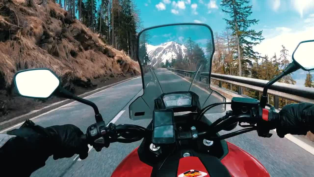 Download Free Stock Video View Of A Motorcycle Driving In The Mountains Live Wallpaper