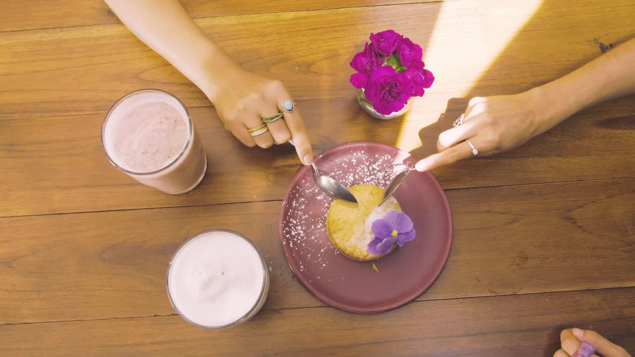 Download Free Stock Video Two People Having A Dessert On The Table Of A Live Wallpaper