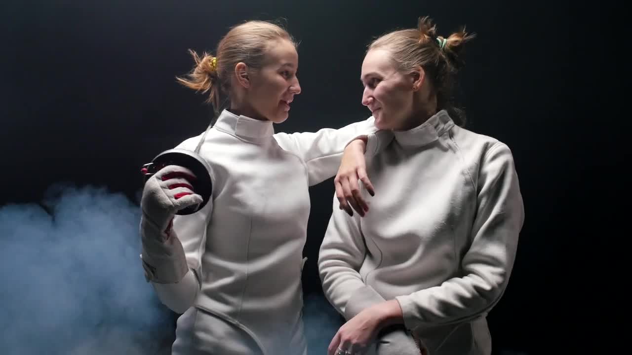 Download Free Stock Video Two Fencer Friends Talking After A Duel Live Wallpaper