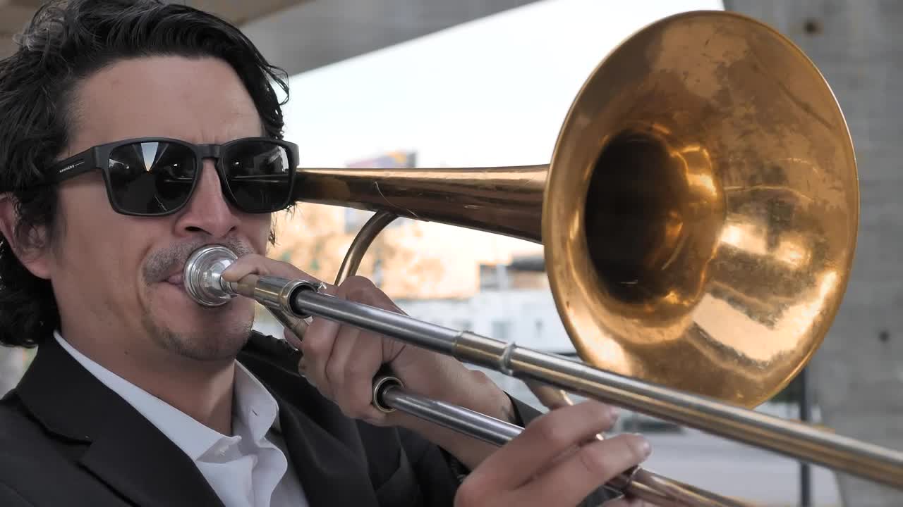 Download Free Stock Video Trombonist Musician Playing His Instrument Live Wallpaper