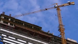 Download Free Stock Video Zooming Out Of A Construction Site With A Crane Live Wallpaper