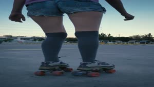 Download Free Stock Video Young Woman Skating Slowly In A Parking Lot Live Wallpaper