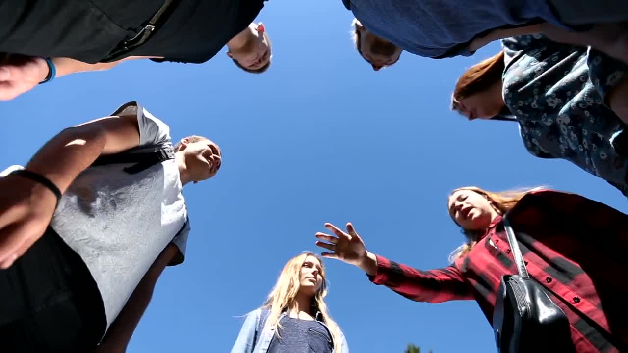 Download Free Stock Video Young People Joining Their Hands To The Center Live Wallpaper