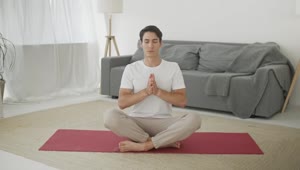 Download Free Stock Video Young Man Meditating At Home Front View Live Wallpaper