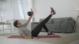 Download Free Stock Video Young Man Doing Exercises At Home Live Wallpaper