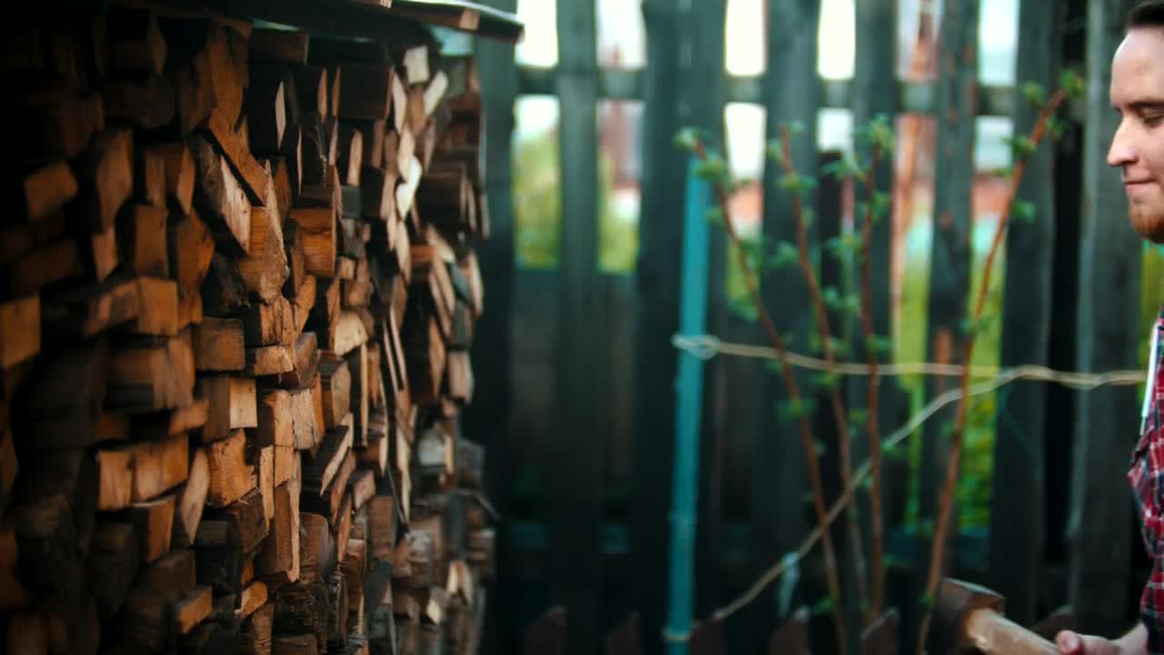 Download Free Stock Video Young Lumberjack Smiling With An Ax In His Hand Live Wallpaper