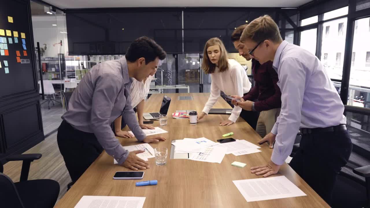 Download Free Stock Video Young Business People In A Meeting Live Wallpaper