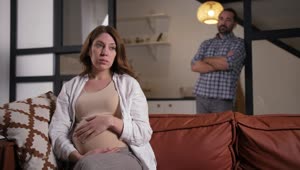 Download Free Stock Video Worried Pregnant Woman And Her Husband At Home Live Wallpaper