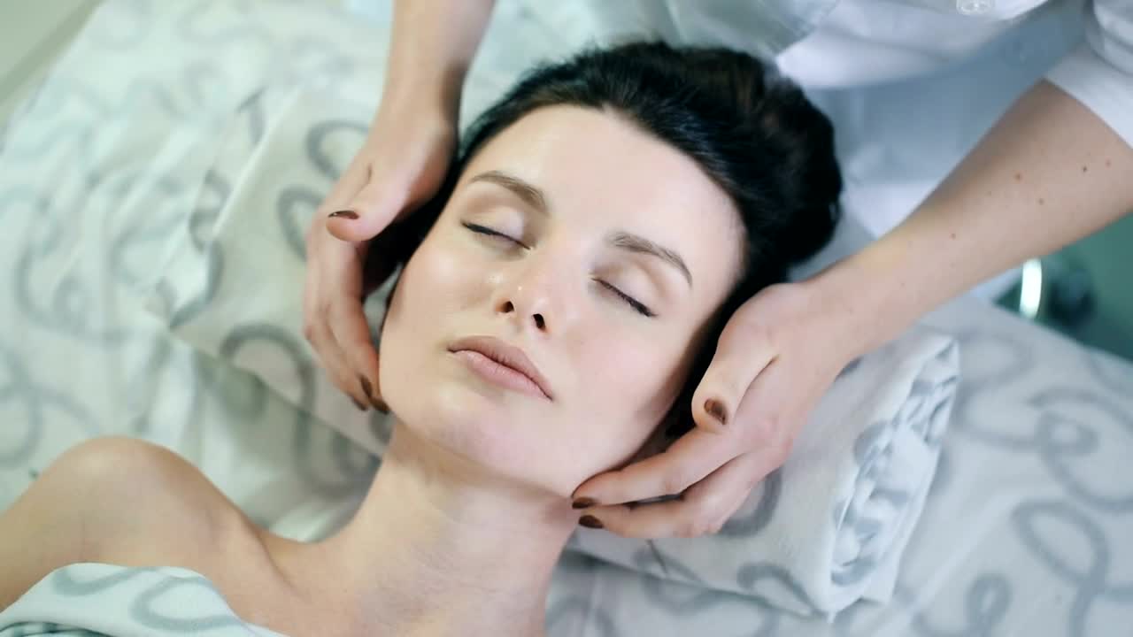 Download Free Stock Video Woman Taking Rejuvenation Therapy On Face Live Wallpaper