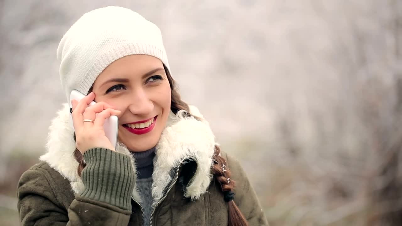 Download Free Stock Video Woman Receiving A Family Call At Christmas Live Wallpaper