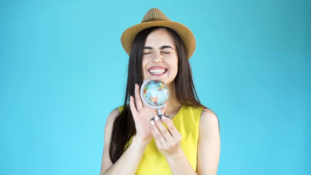 Download   Stock Footage Woman Chooses A Country To Travel On A Globe Live Wallpaper