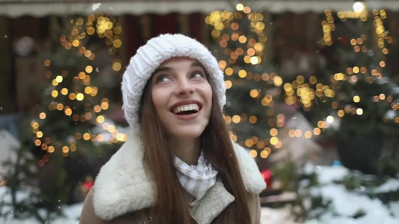 Download   Stock Footage Woman Celebrates Snowfall And Spins In Street Live Wallpaper