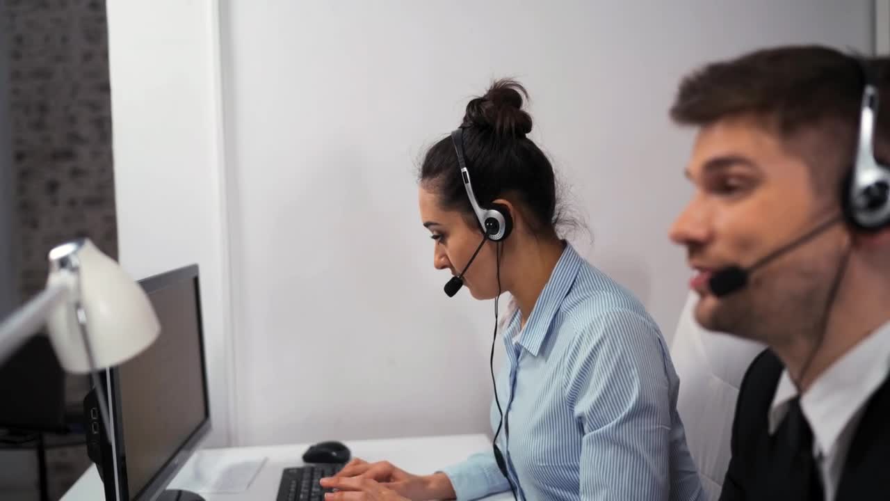 Download   Stock Footage Woman And Man Working At A Call Center Live Wallpaper