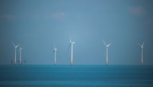 Download   Stock Footage Wind Farms Out At Sea Live Wallpaper