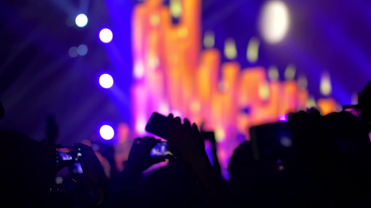 Download   Stock Footage Waving Phones At A Concert Live Wallpaper