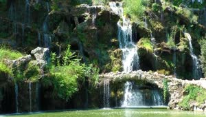 Download   Stock Footage Waterfalls On A Beautiful Lake Live Wallpaper