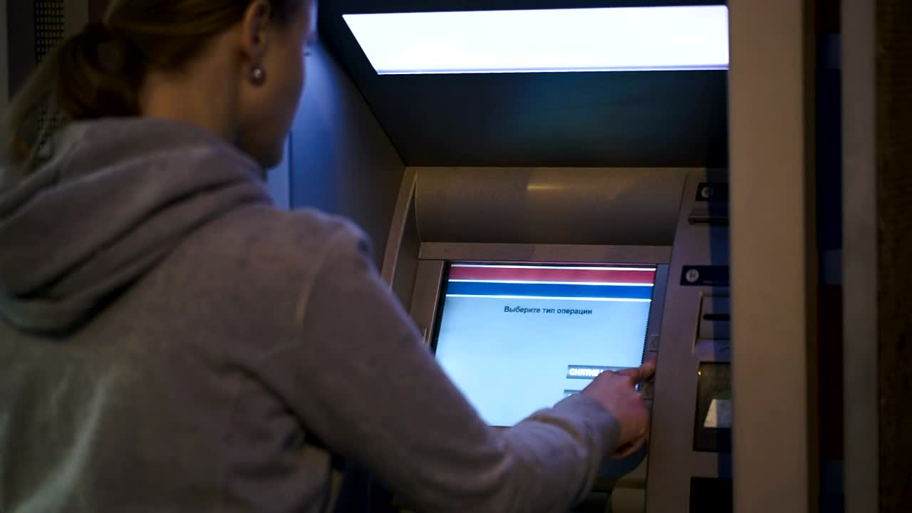 Download   Stock Footage Using An Atm Machine Live Wallpaper