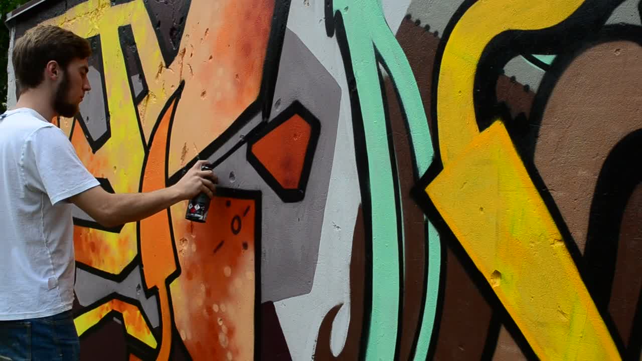 Download   Stock Footage Urban Artist Spraying A Mural Live Wallpaper