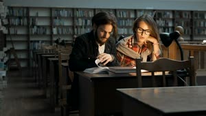 Download   Stock Footage University Students Studying Late In The Library Live Wallpaper